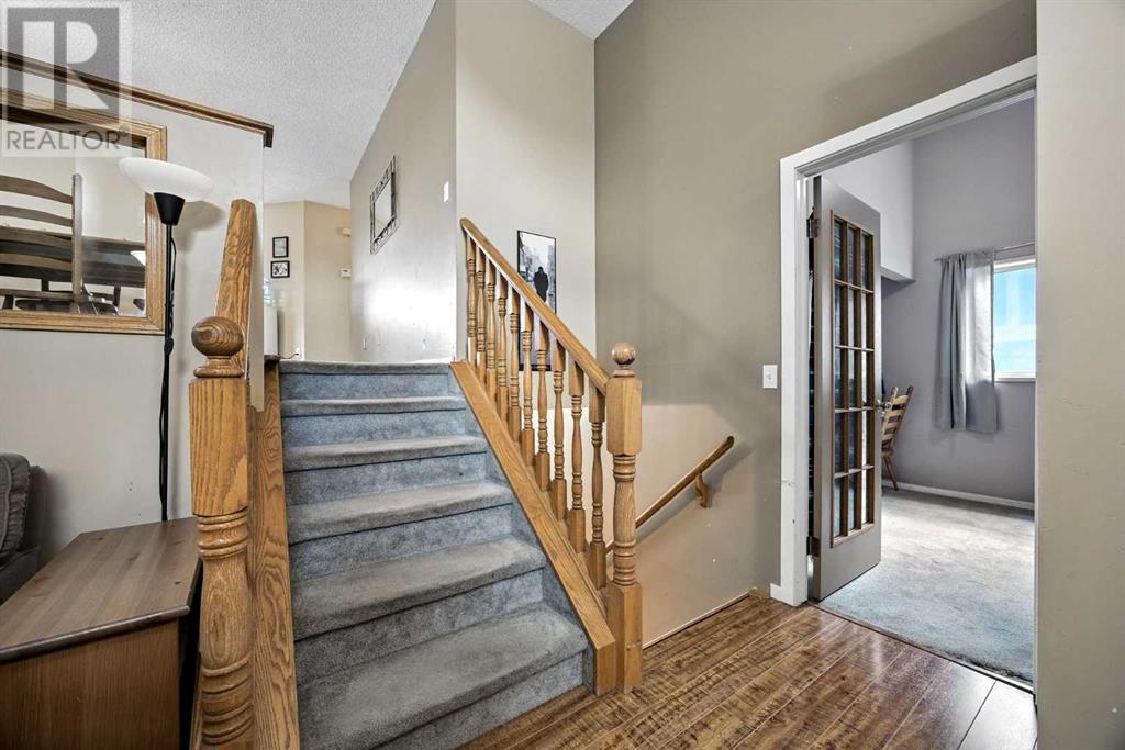 Single Family House 3 Level for Sale in  Riverstone Close SE Riverbend Calgary 