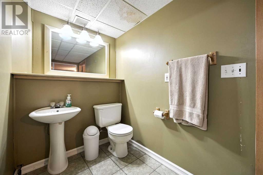 Single Family House 3 Level for Sale in  Riverstone Close SE Riverbend Calgary 