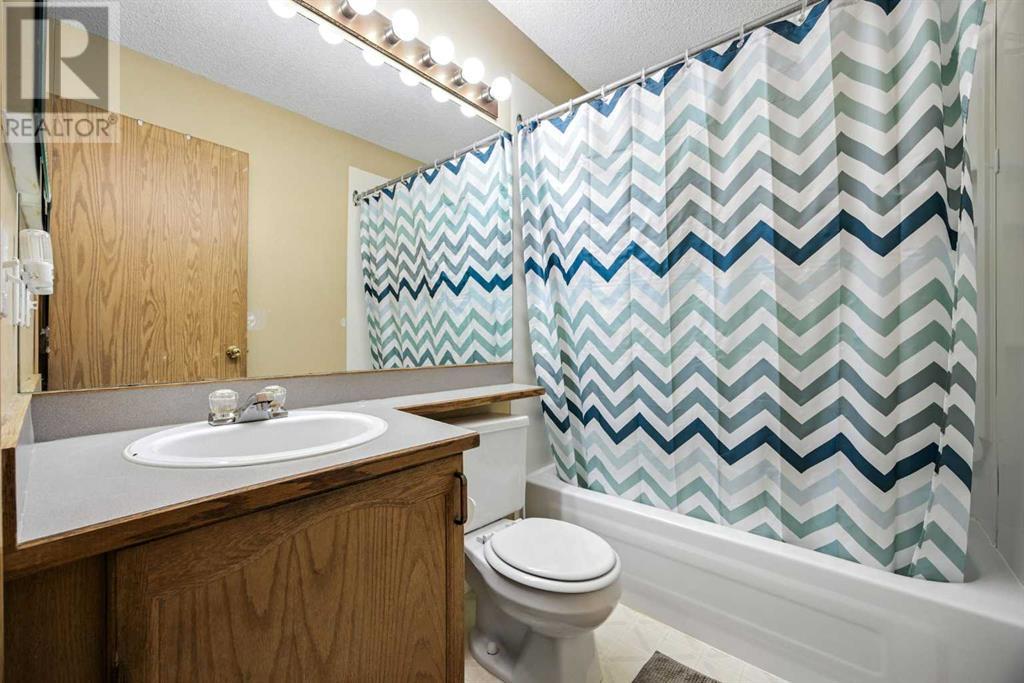 Single Family House 3 Level for Sale in  Riverstone Close SE Riverbend Calgary 