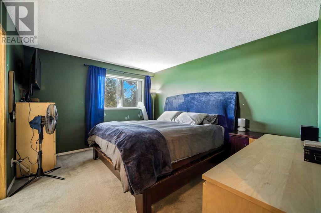 Single Family House 3 Level for Sale in  Riverstone Close SE Riverbend Calgary 