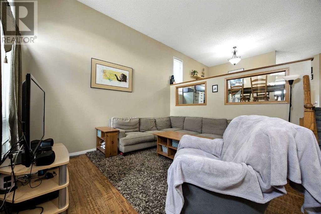 Single Family House 3 Level for Sale in  Riverstone Close SE Riverbend Calgary 