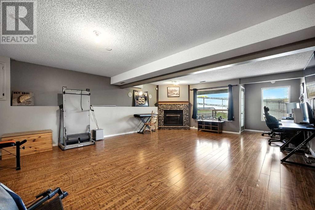Single Family House 3 Level for Sale in  Riverstone Close SE Riverbend Calgary 
