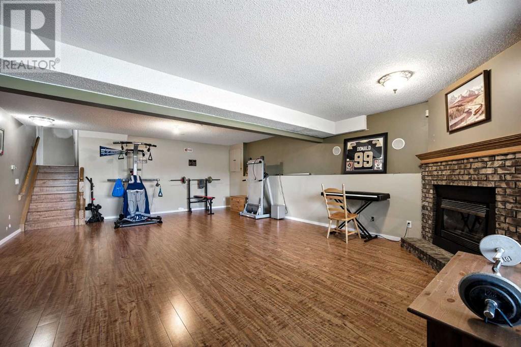 Single Family House 3 Level for Sale in  Riverstone Close SE Riverbend Calgary 