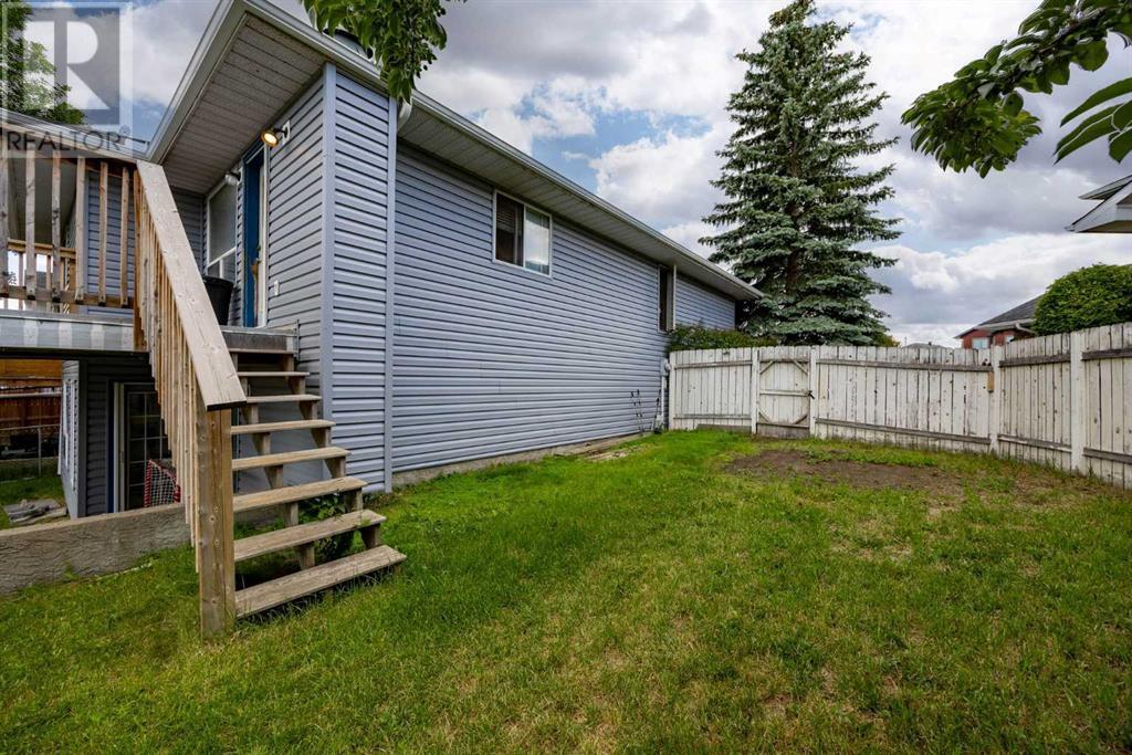 Single Family House 3 Level for Sale in  Riverstone Close SE Riverbend Calgary 