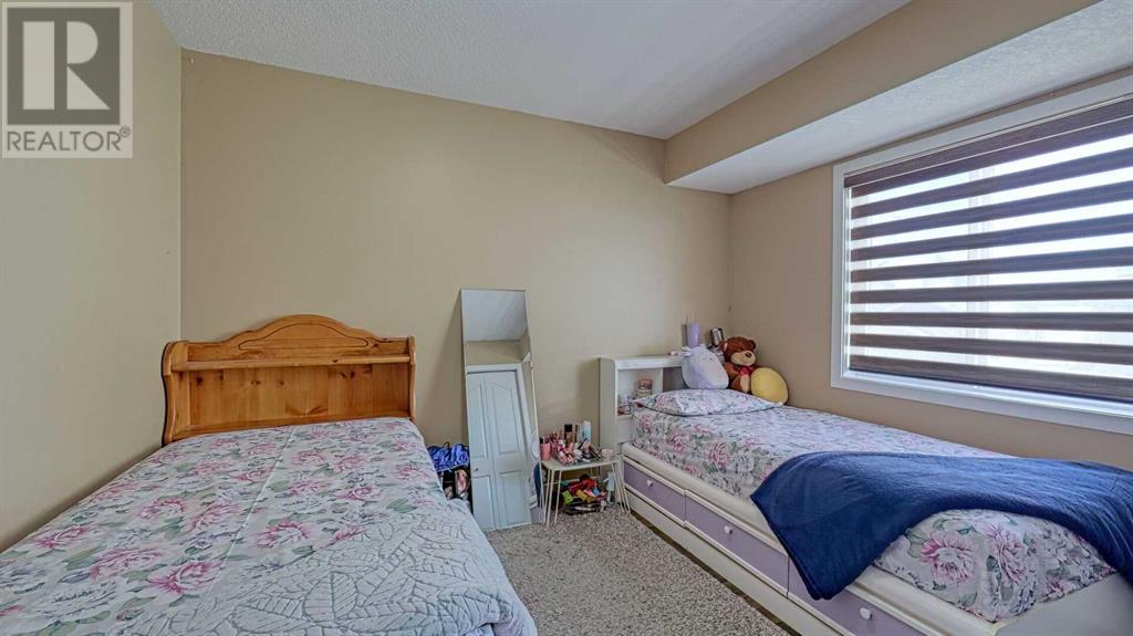 Single Family House Bi-level for Sale in  Taravista Mews NE Taradale Calgary 