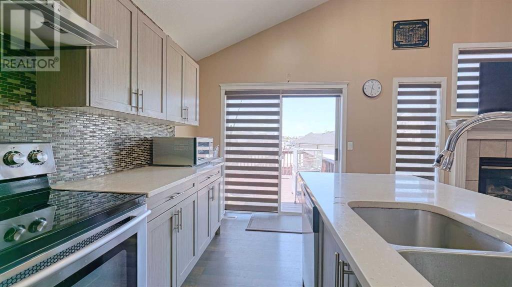 Single Family House Bi-level for Sale in  Taravista Mews NE Taradale Calgary 