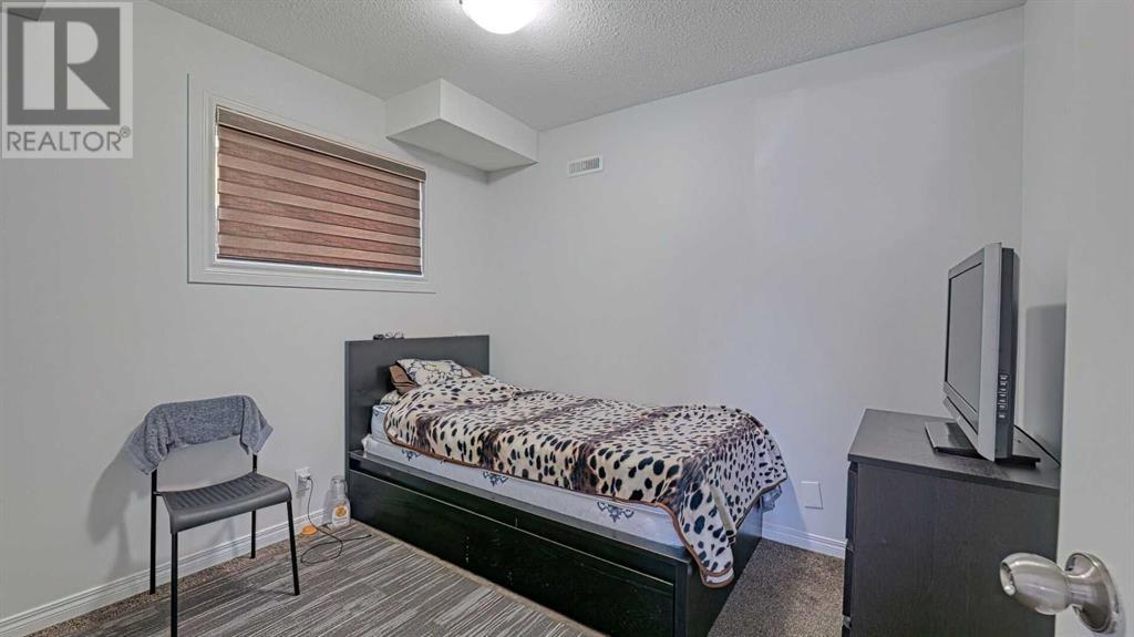 Single Family House Bi-level for Sale in  Taravista Mews NE Taradale Calgary 