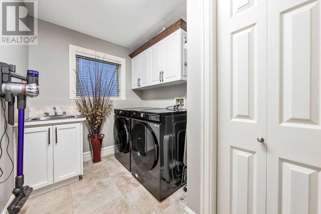 Single Family House for Sale in  Signature Way SW Signal Hill Calgary 