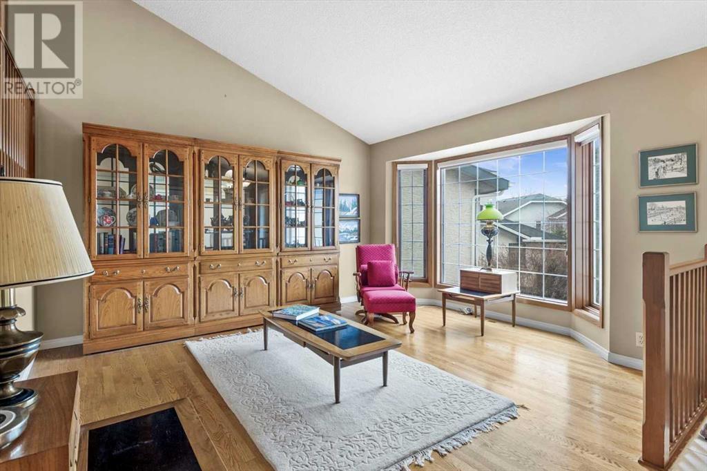 Single Family House 4 Level for Sale in  Strathaven Mews SW Strathcona Park Calgary 