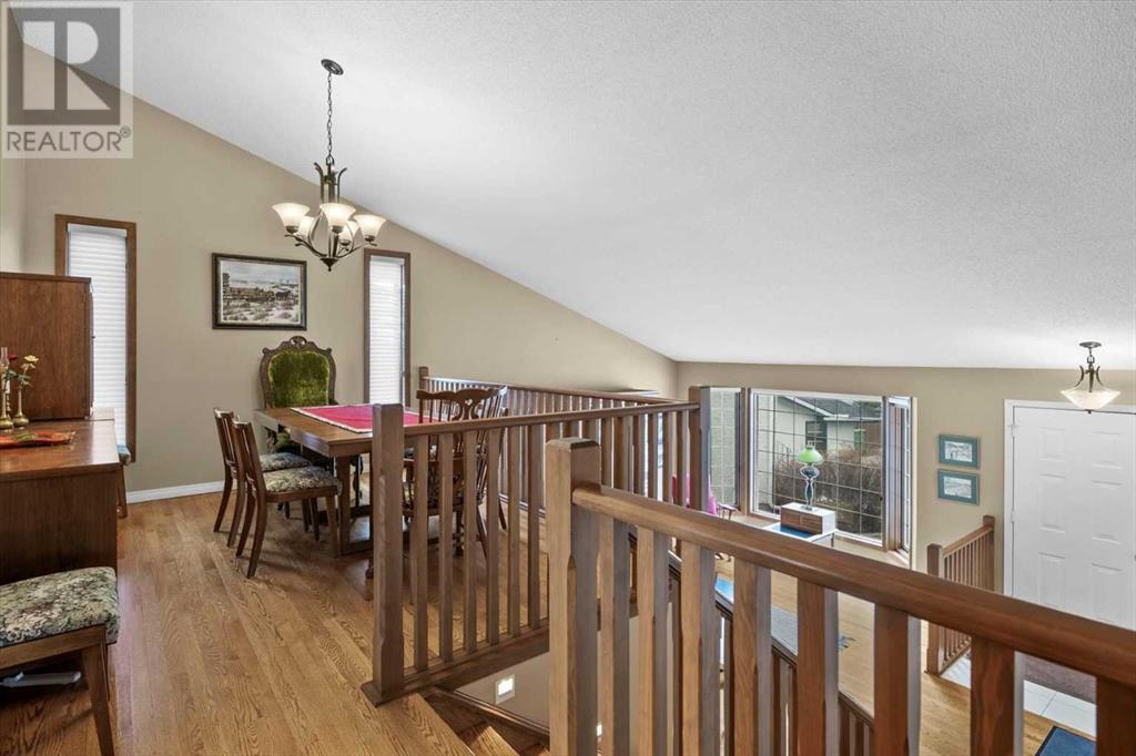 Single Family House 4 Level for Sale in  Strathaven Mews SW Strathcona Park Calgary 