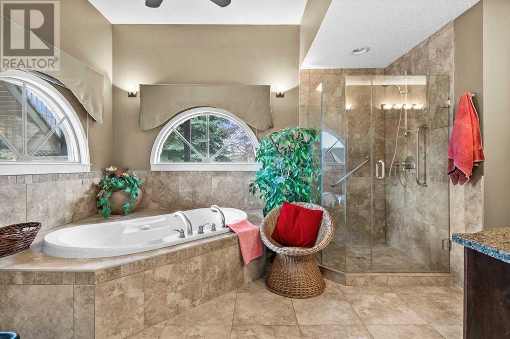 Single Family House 4 Level for Sale in  Strathaven Mews SW Strathcona Park Calgary 