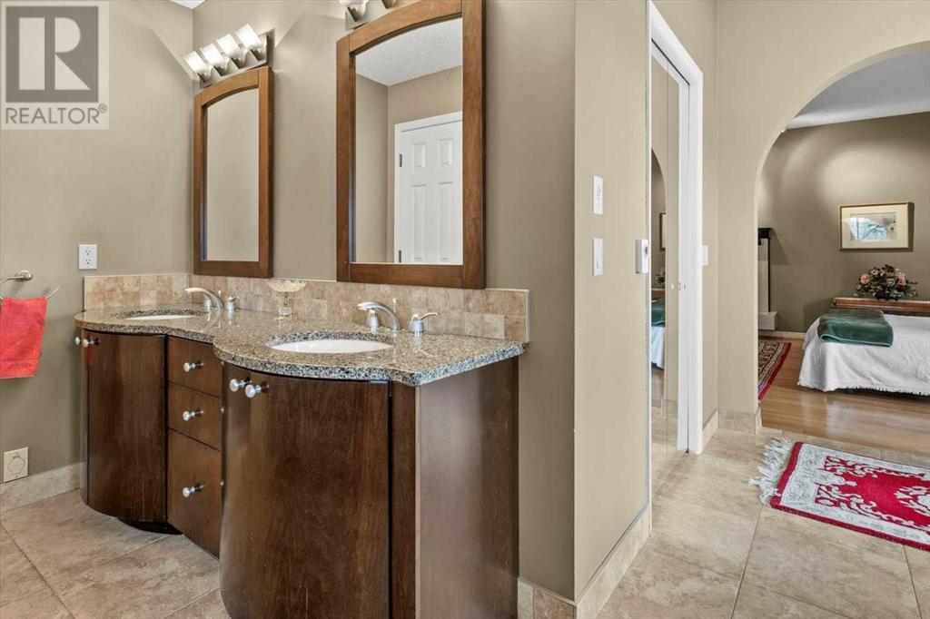 Single Family House 4 Level for Sale in  Strathaven Mews SW Strathcona Park Calgary 