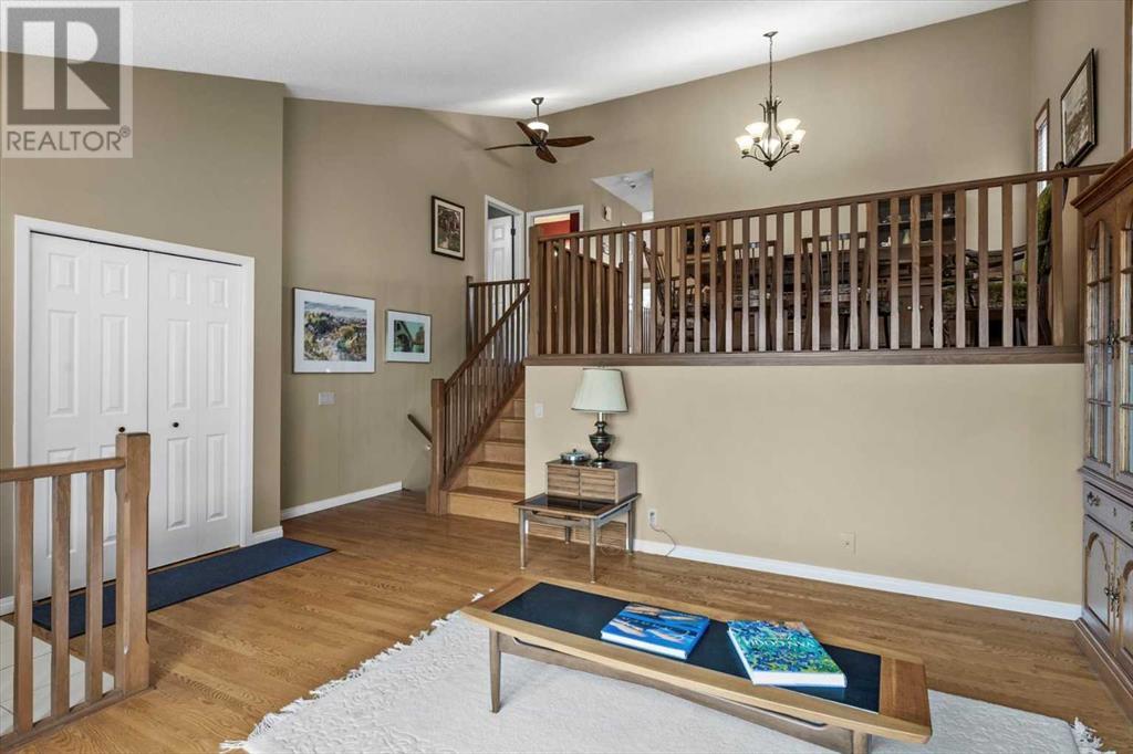 Single Family House 4 Level for Sale in  Strathaven Mews SW Strathcona Park Calgary 