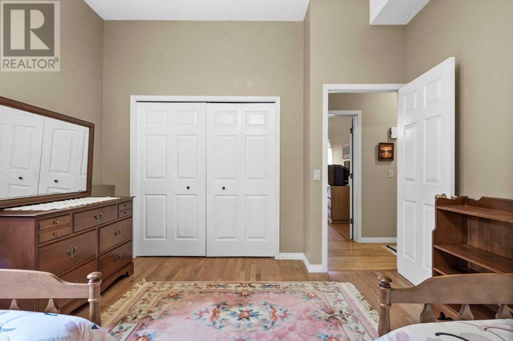 Single Family House 4 Level for Sale in  Strathaven Mews SW Strathcona Park Calgary 
