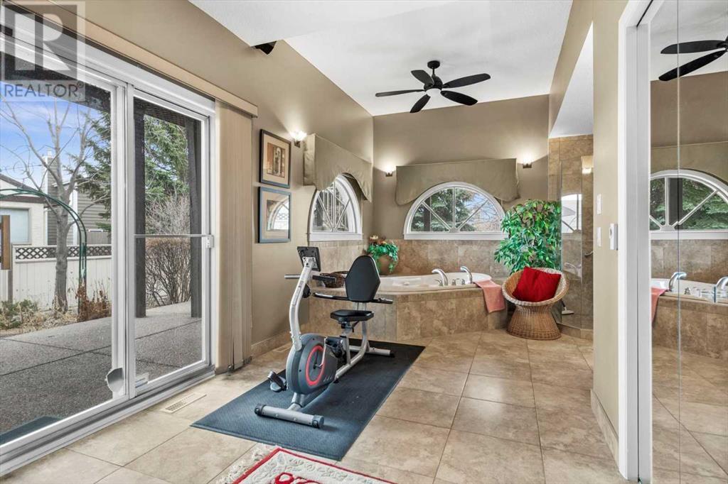 Single Family House 4 Level for Sale in  Strathaven Mews SW Strathcona Park Calgary 