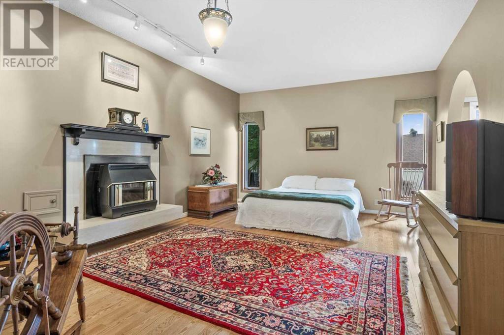 Single Family House 4 Level for Sale in  Strathaven Mews SW Strathcona Park Calgary 