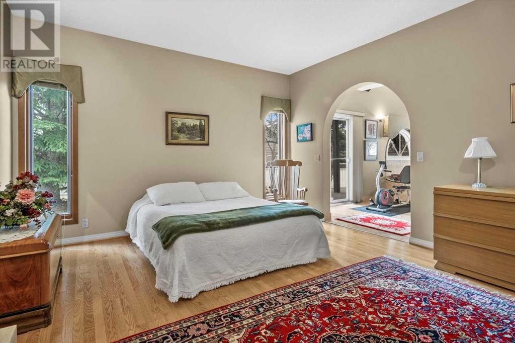 Single Family House 4 Level for Sale in  Strathaven Mews SW Strathcona Park Calgary 