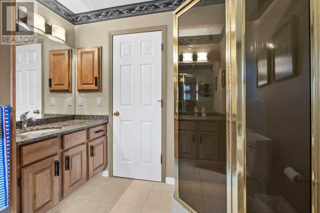 Single Family House 4 Level for Sale in  Strathaven Mews SW Strathcona Park Calgary 