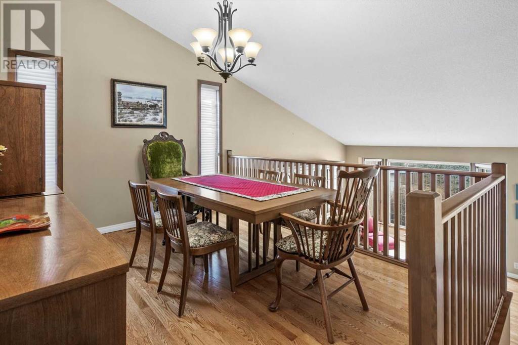 Single Family House 4 Level for Sale in  Strathaven Mews SW Strathcona Park Calgary 