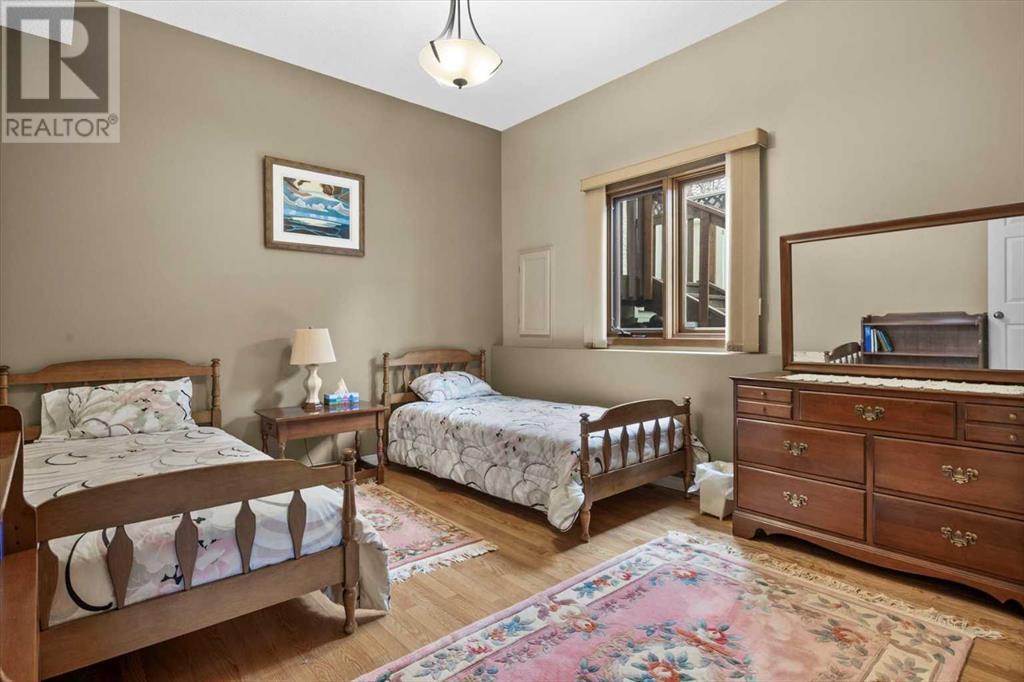 Single Family House 4 Level for Sale in  Strathaven Mews SW Strathcona Park Calgary 