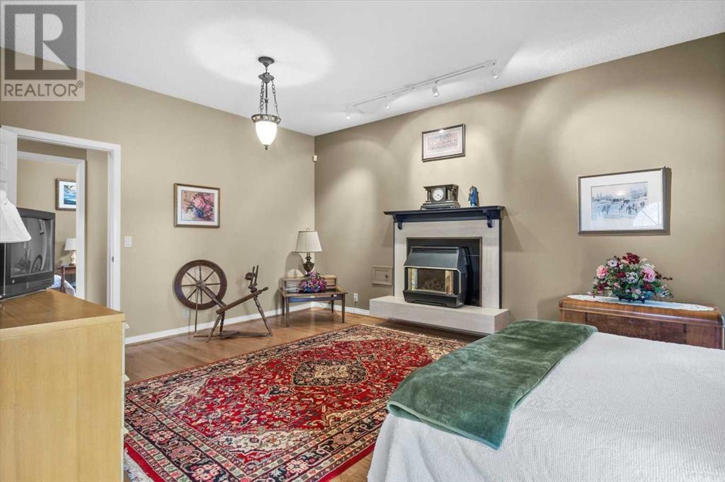 Single Family House 4 Level for Sale in  Strathaven Mews SW Strathcona Park Calgary 