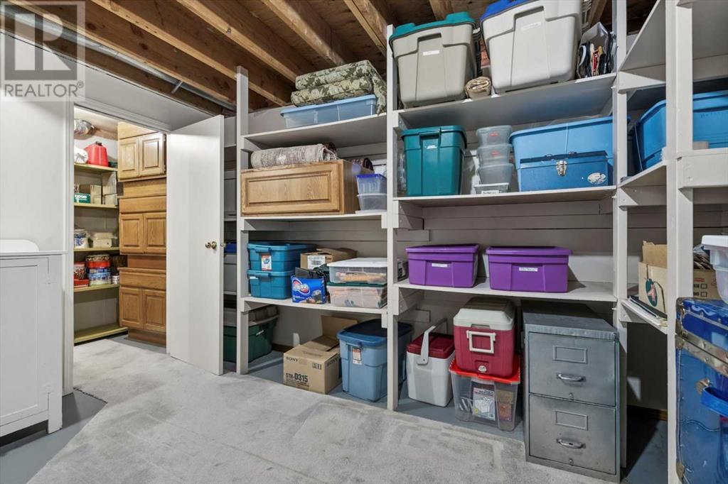 Single Family House 4 Level for Sale in  Strathaven Mews SW Strathcona Park Calgary 