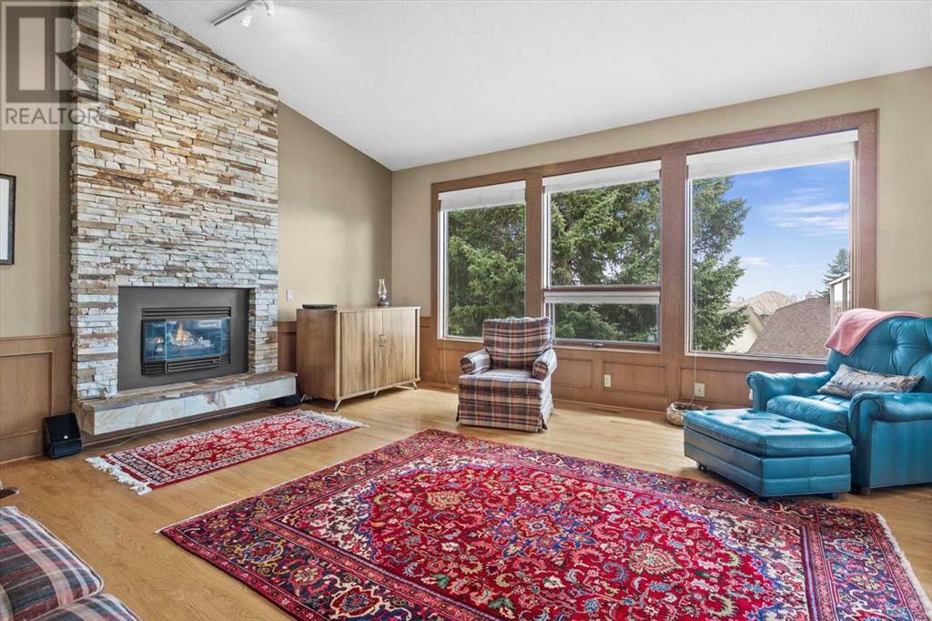Single Family House 4 Level for Sale in  Strathaven Mews SW Strathcona Park Calgary 