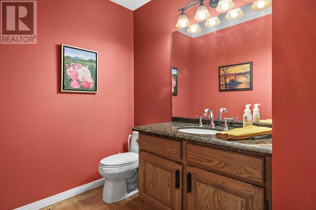 Single Family House 4 Level for Sale in  Strathaven Mews SW Strathcona Park Calgary 