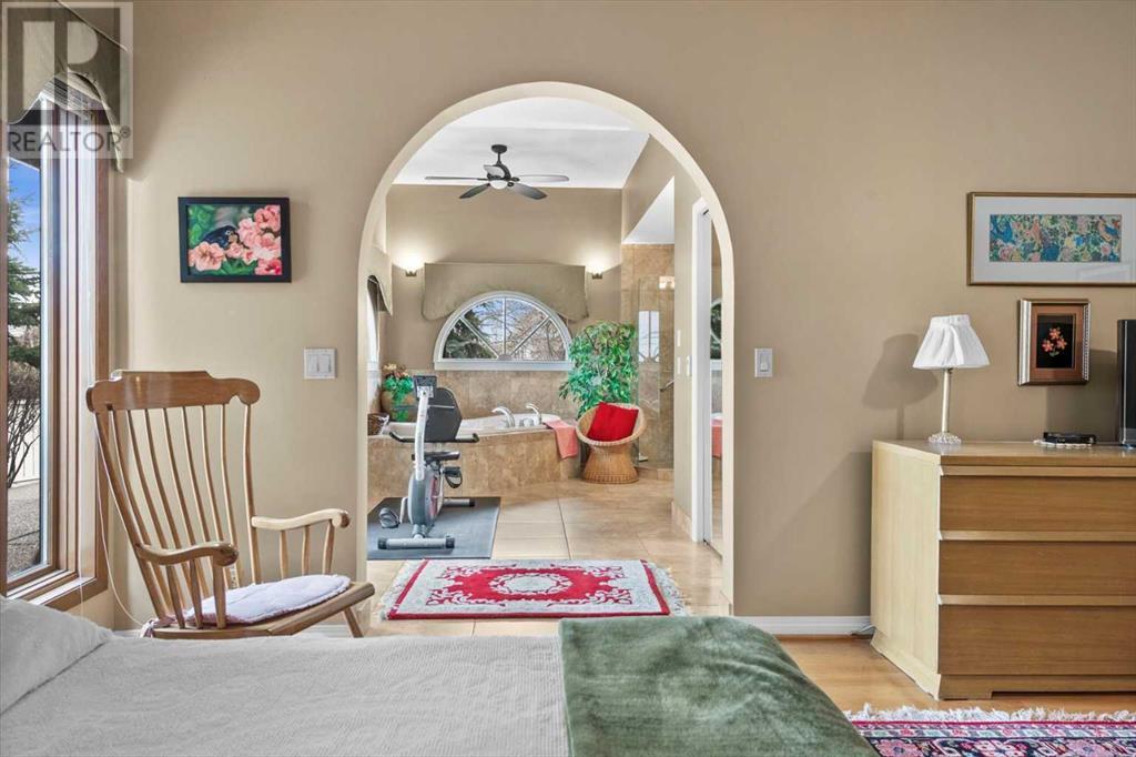 Single Family House 4 Level for Sale in  Strathaven Mews SW Strathcona Park Calgary 