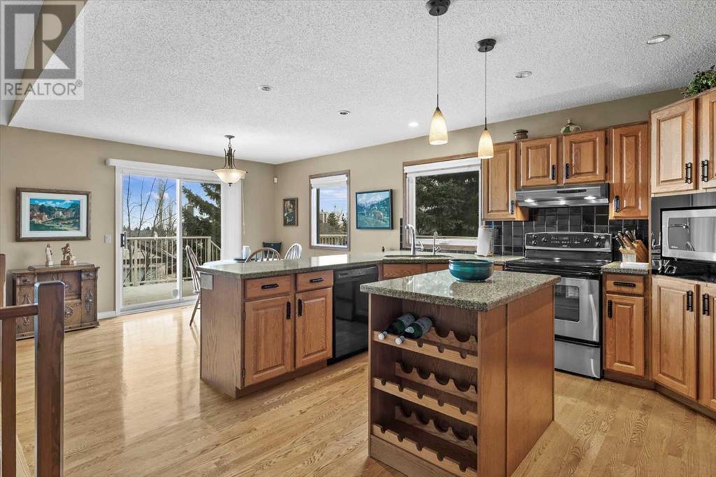 Single Family House 4 Level for Sale in  Strathaven Mews SW Strathcona Park Calgary 