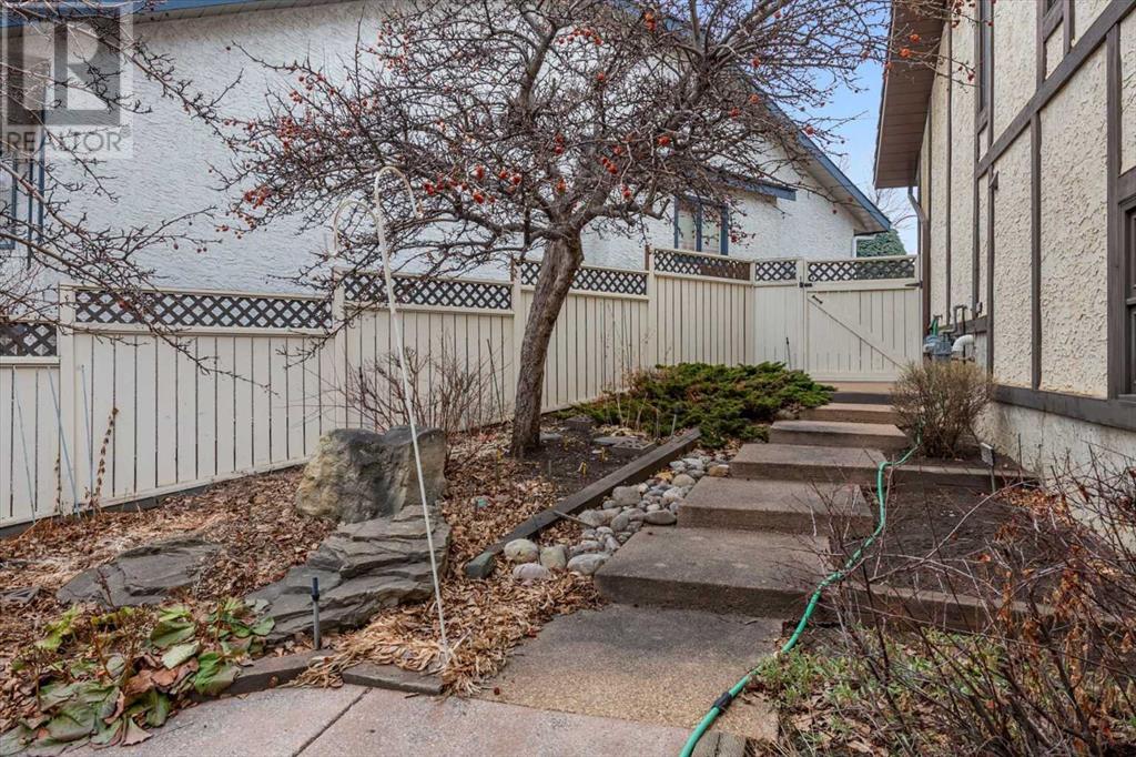 Single Family House 4 Level for Sale in  Strathaven Mews SW Strathcona Park Calgary 