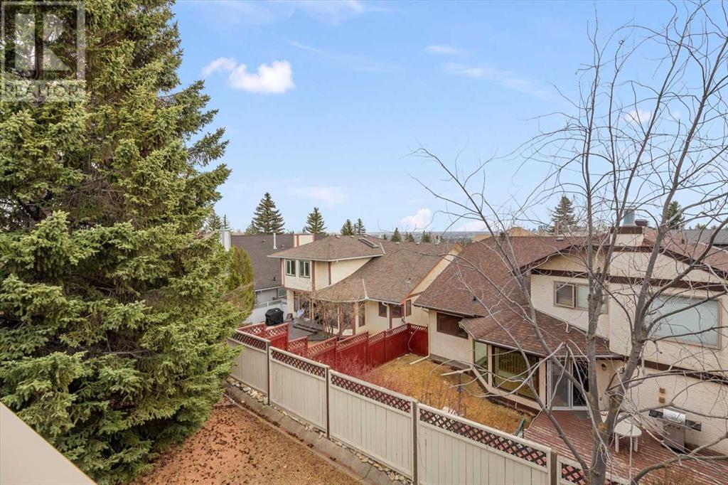 Single Family House 4 Level for Sale in  Strathaven Mews SW Strathcona Park Calgary 