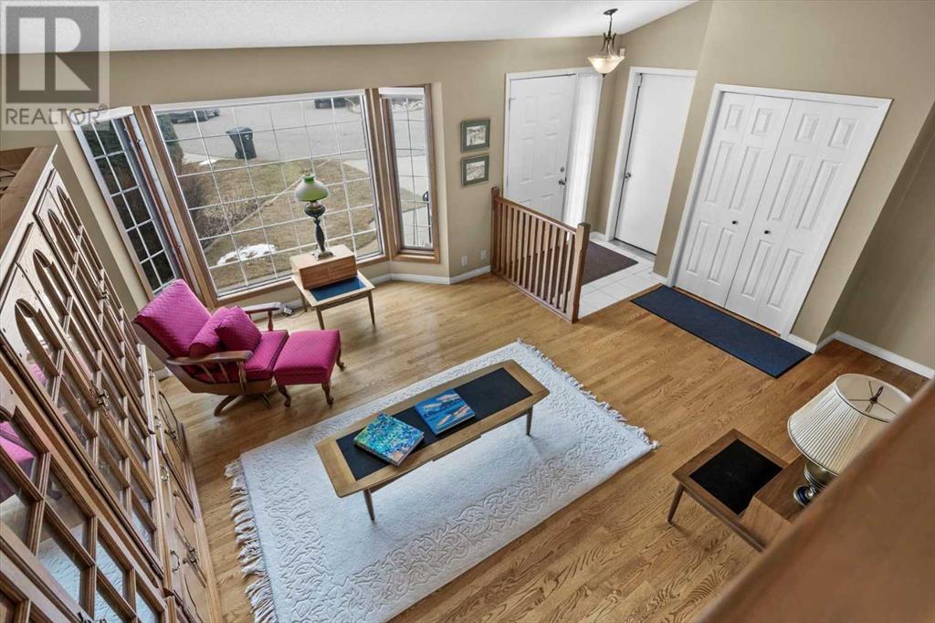Single Family House 4 Level for Sale in  Strathaven Mews SW Strathcona Park Calgary 
