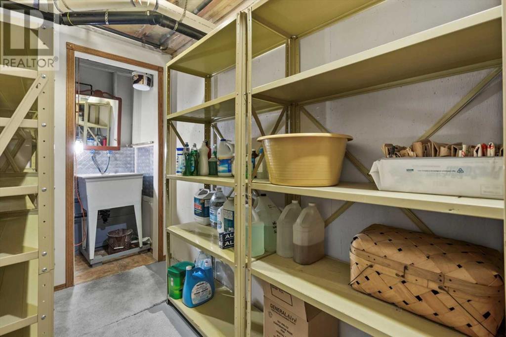 Single Family House 4 Level for Sale in  Strathaven Mews SW Strathcona Park Calgary 