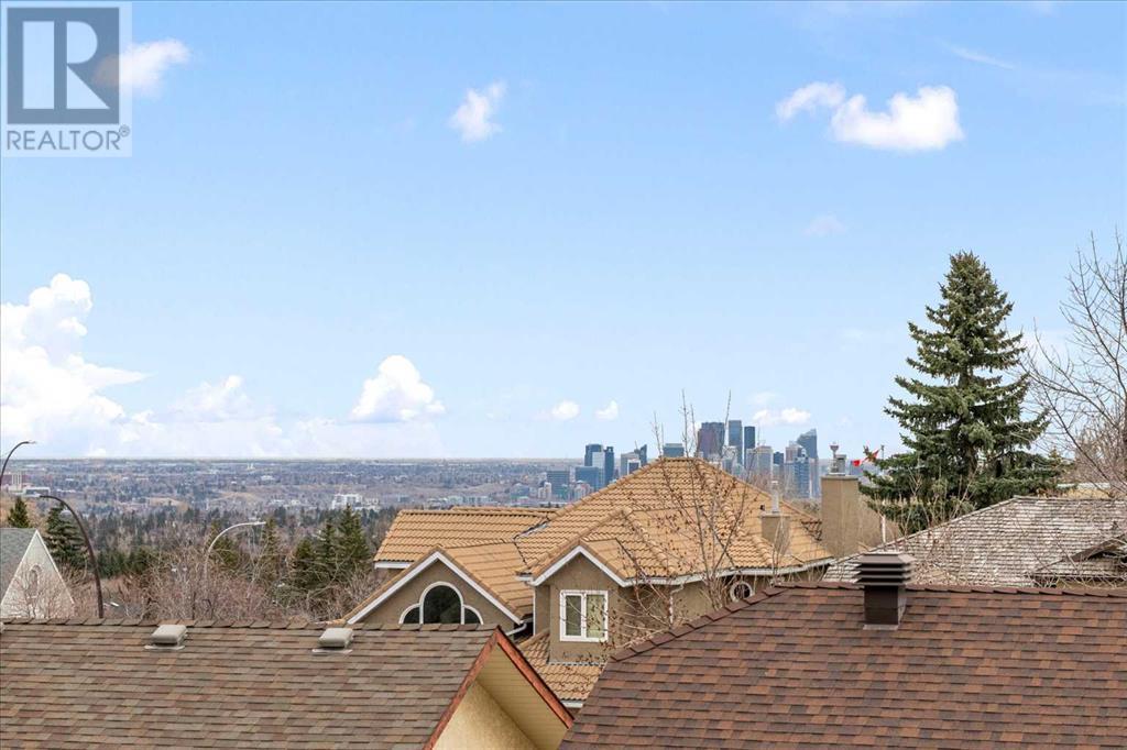 Single Family House 4 Level for Sale in  Strathaven Mews SW Strathcona Park Calgary 
