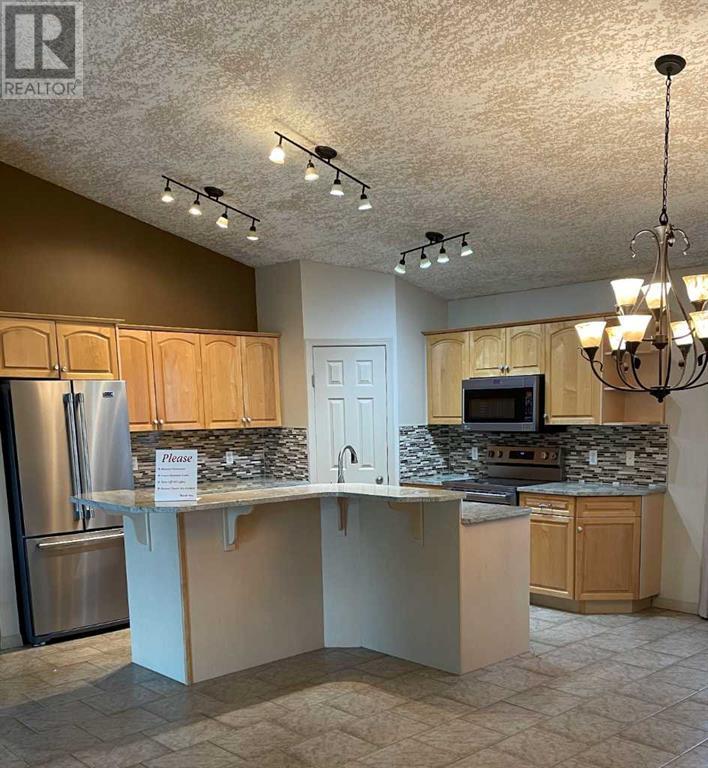 Single Family House Bungalow for Sale in  Coventry Drive NE Coventry Hills Calgary 