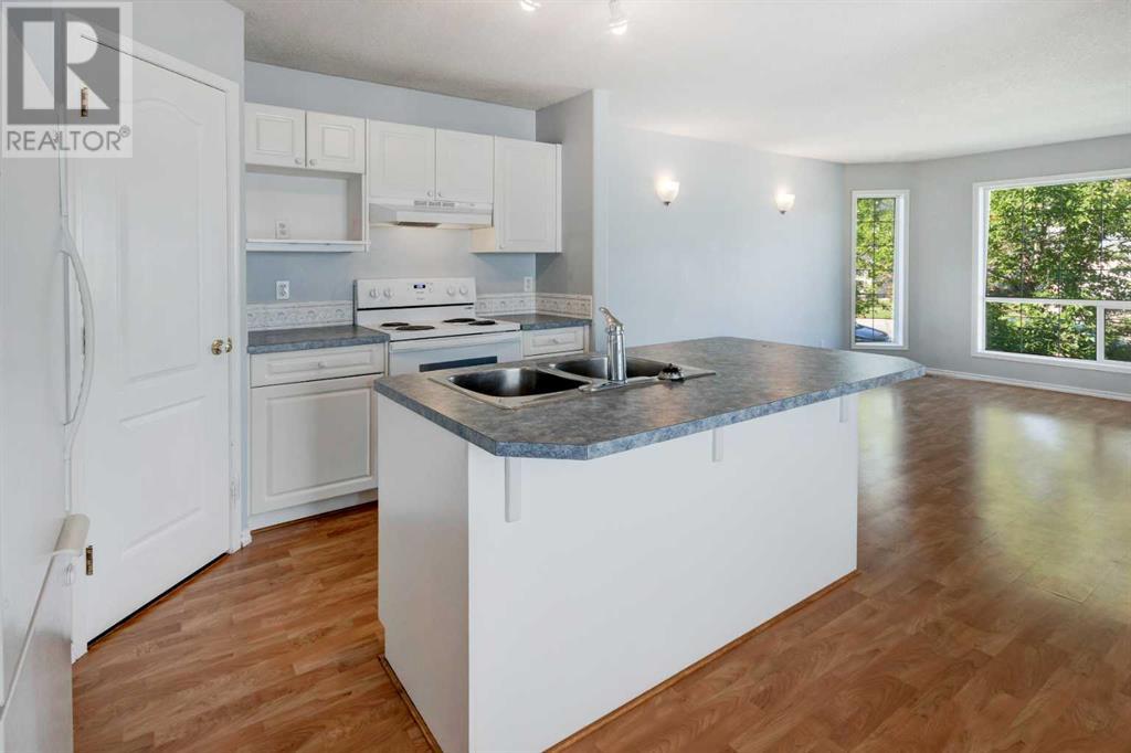 Single Family House Bi-level for Sale in  Laguna Way NE Monterey Park Calgary 