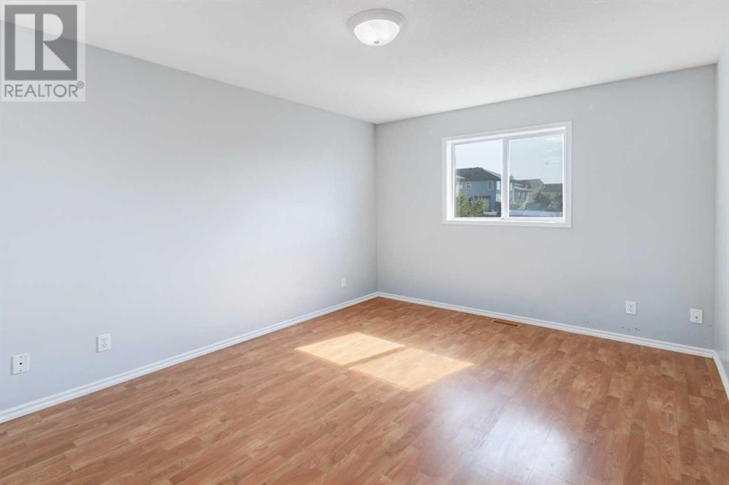 Single Family House Bi-level for Sale in  Laguna Way NE Monterey Park Calgary 