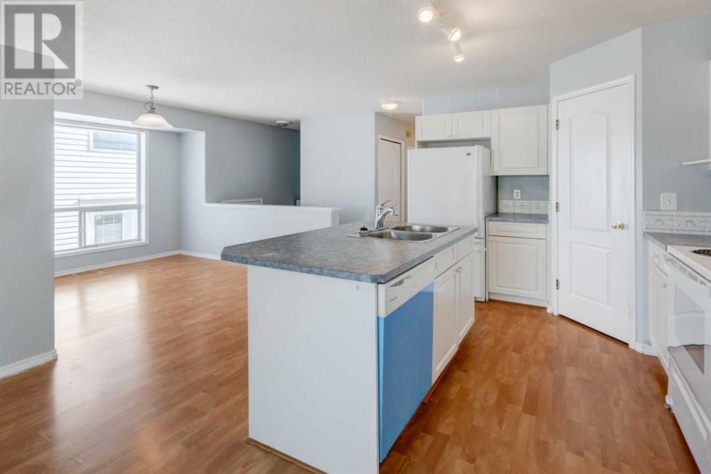 Single Family House Bi-level for Sale in  Laguna Way NE Monterey Park Calgary 