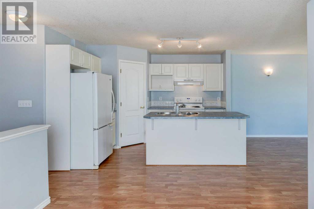 Single Family House Bi-level for Sale in  Laguna Way NE Monterey Park Calgary 
