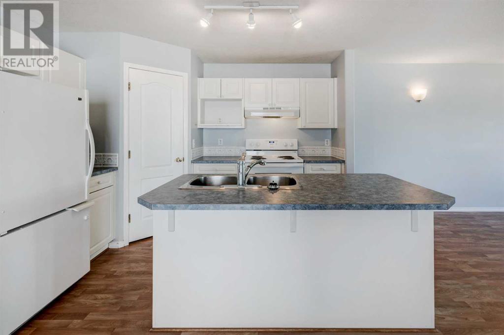 Single Family House Bi-level for Sale in  Laguna Way NE Monterey Park Calgary 