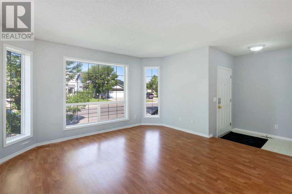 Single Family House Bi-level for Sale in  Laguna Way NE Monterey Park Calgary 