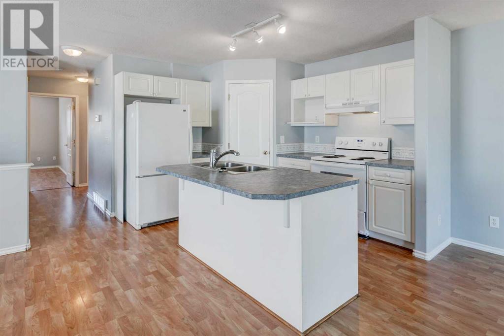 Single Family House Bi-level for Sale in  Laguna Way NE Monterey Park Calgary 