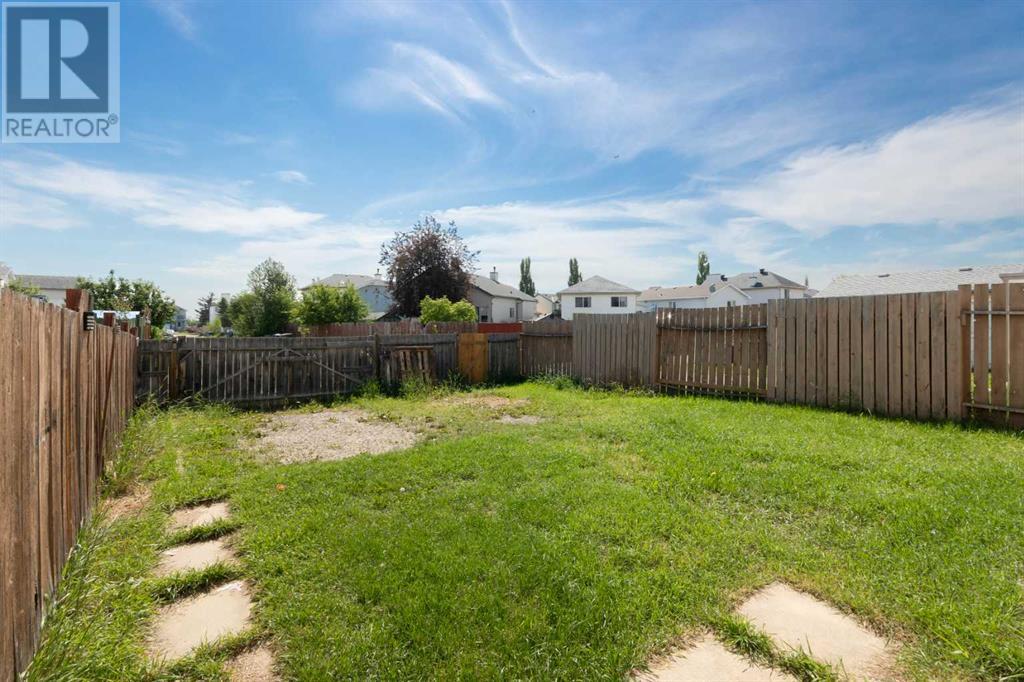 Single Family House Bi-level for Sale in  Laguna Way NE Monterey Park Calgary 