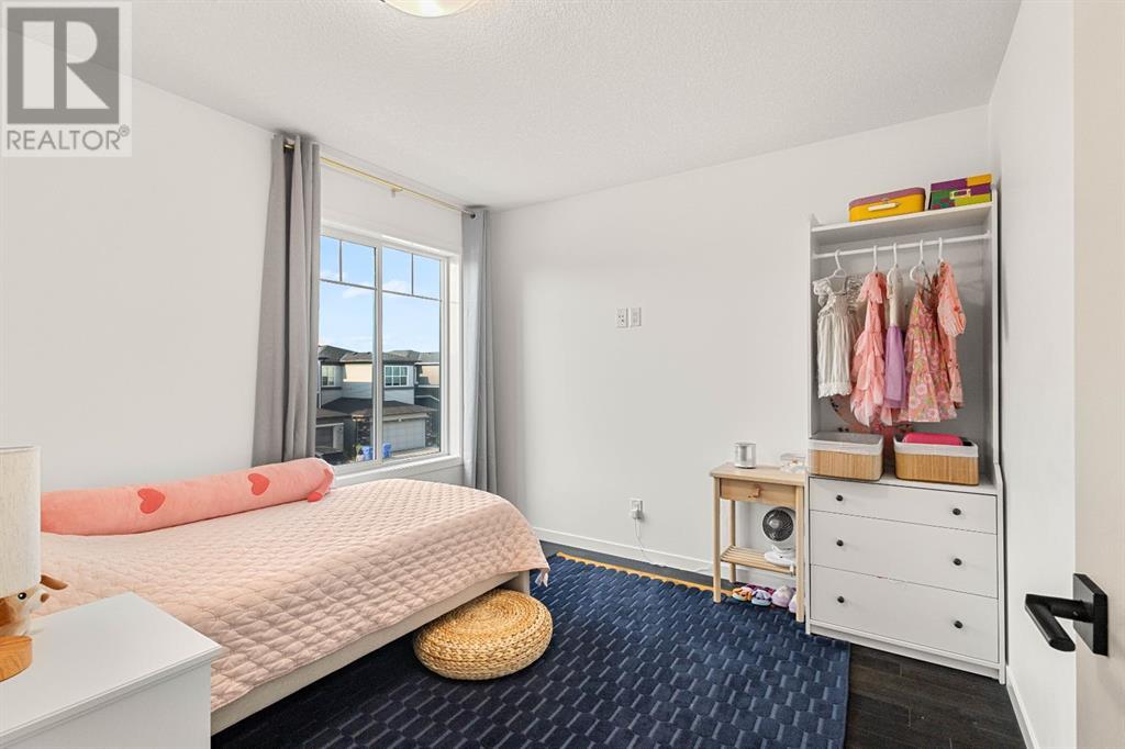 Single Family House for Sale in  Belmont Heath SW Belmont Calgary 