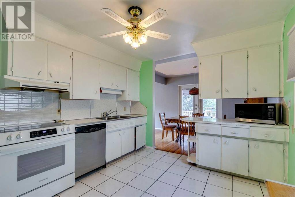 Multi-family House Bungalow for Sale in  &  Lissington Drive SW North Glenmore Park Calgary 