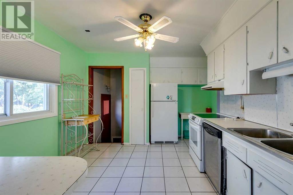 Multi-family House Bungalow for Sale in  &  Lissington Drive SW North Glenmore Park Calgary 