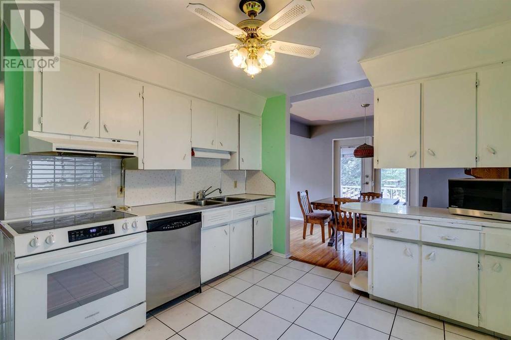Multi-family House Bungalow for Sale in  &  Lissington Drive SW North Glenmore Park Calgary 