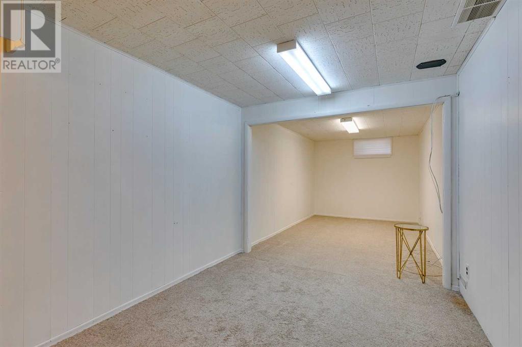 Multi-family House Bungalow for Sale in  &  Lissington Drive SW North Glenmore Park Calgary 