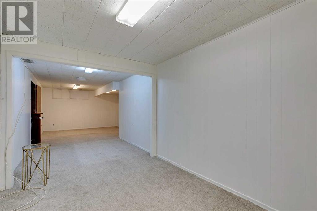 Multi-family House Bungalow for Sale in  &  Lissington Drive SW North Glenmore Park Calgary 